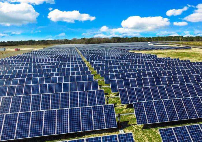 This aerial view shows a similar solar farm in North Carolina, using the same type of solar panels, illustrating what the new project will look like when it is completed by the end of this year.